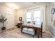Inviting dining room with a rustic wooden table, comfortable seating, and natural light streaming through the windows at 1099 Valentine Ln, Carmel, IN 46032