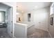 Upstairs hallway with neutral colors and carpeted floors at 1099 Valentine Ln, Carmel, IN 46032