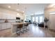 Modern kitchen featuring a center island with bar stools, stainless steel appliances, and an open layout at 1099 Valentine Ln, Carmel, IN 46032