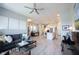 Spacious living room with an open floor plan, hardwood floors, and ample natural light at 1099 Valentine Ln, Carmel, IN 46032