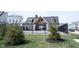 Community pool area is fenced in for added security, with a covered building in the background at 1099 Valentine Ln, Carmel, IN 46032