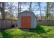 Backyard shed with barn doors, a storage solution for all your outdoor tools and equipment at 1109 Oakwood Trl, Indianapolis, IN 46260