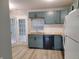 Updated kitchen featuring modern cabinets, countertops, and stainless steel appliances at 11152 Dura Dr, Indianapolis, IN 46229