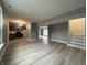 Open concept floor plan featuring living room, kitchen, and staircase at 11152 Dura Dr, Indianapolis, IN 46229