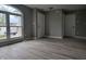 Spacious living area with modern floors, fresh paint, and ample natural light at 11152 Dura Dr, Indianapolis, IN 46229