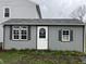 Charming shed with a white door, windows, and neutral paint color at 11152 Dura Dr, Indianapolis, IN 46229