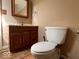 Cozy bathroom featuring classic vanity and a standard toilet at 1140 Hoyt Ave, Indianapolis, IN 46203