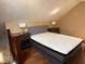 Comfortable bedroom with hardwood floors and neutral wall color at 1140 Hoyt Ave, Indianapolis, IN 46203