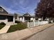 Charming home with a fenced front yard and traditional curb appeal at 1140 Hoyt Ave, Indianapolis, IN 46203