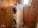 Efficient laundry area with a stacked washer and dryer unit at 1140 Hoyt Ave, Indianapolis, IN 46203