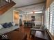 Inviting living room flows into a bright kitchen with stainless steel appliances at 1140 Hoyt Ave, Indianapolis, IN 46203