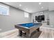 Basement game room with pool table, decor, and accessories perfect for hours of entertainment at 11410 Sea Side Dr, Fishers, IN 46040
