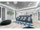 Entertainment room with home theatre seating and modern lighting for a luxurious experience at 11410 Sea Side Dr, Fishers, IN 46040