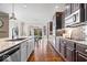 Modern kitchen with granite countertops, stainless steel appliances, and an eat-in area with natural light at 11410 Sea Side Dr, Fishers, IN 46040