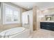 Spa-like primary bathroom with a soaking tub and separate walk-in shower at 11410 Sea Side Dr, Fishers, IN 46040