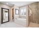 Elegant primary bathroom featuring a walk-in shower and soaking tub at 11410 Sea Side Dr, Fishers, IN 46040