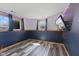 Finished basement area with modern flooring and natural light from windows at 1206 Rosengarten Dr, Greenwood, IN 46142