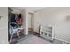 Bedroom featuring wood-look floors, closet and a book shelf at 1206 Rosengarten Dr, Greenwood, IN 46142