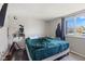 Bedroom with wood-look floors, large window and a bed at 1206 Rosengarten Dr, Greenwood, IN 46142