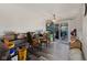 The dining area has wood-look floors and a ceiling fan at 1206 Rosengarten Dr, Greenwood, IN 46142
