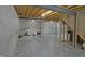 Unfinished basement with exposed beams and concrete floor; ready to be customized at 12326 River Valley Dr, Fishers, IN 46037