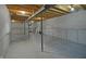 Spacious unfinished basement featuring a concrete floor and exposed ceiling at 12326 River Valley Dr, Fishers, IN 46037