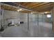 Unfinished basement with concrete floor and exposed ceiling, offering potential for customization at 12326 River Valley Dr, Fishers, IN 46037