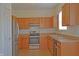 Well-appointed kitchen with wood cabinetry, stainless steel appliances, and ample counter space at 12326 River Valley Dr, Fishers, IN 46037