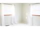 Light-filled room with plush carpeting, large windows, and white curtains at 126 Mercator Dr, Greenwood, IN 46143