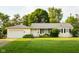 Charming single-story home with a well-maintained lawn and attached garage at 126 Mercator Dr, Greenwood, IN 46143