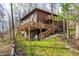 Expansive backyard featuring a spacious deck, perfect for outdoor entertaining and enjoying nature at 13306 W 50 S, Columbus, IN 47201