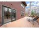 Exterior view highlighting the sliding door access to the deck and its inviting layout with outdoor seating at 13306 W 50 S, Columbus, IN 47201