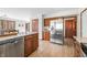 Spacious kitchen featuring stainless steel appliances, granite countertops, and wood cabinets at 13306 W 50 S, Columbus, IN 47201