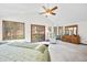 Large main bedroom featuring vaulted ceilings and wood trim at 13306 W 50 S, Columbus, IN 47201