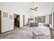 Spacious main bedroom with vaulted ceilings, a ceiling fan, and a walk-in closet at 13306 W 50 S, Columbus, IN 47201
