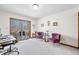 Bright home office with access to a private balcony overlooking the surrounding woods at 13306 W 50 S, Columbus, IN 47201