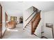 Stairway leading to the second floor is adjacent to the living room at 13306 W 50 S, Columbus, IN 47201