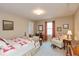Comfortable bedroom featuring a bed, chair, and an accent wall at 14195 Holly Berry Cir, Fishers, IN 46038