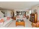 Inviting living room featuring an open layout to the adjacent kitchen at 14195 Holly Berry Cir, Fishers, IN 46038