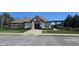 Exterior of amenity center with stone and siding, trimmed lawn and landscaping at 14878 Horse Branch Way, Fishers, IN 46040