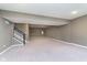 Unfinished basement with carpet and stairs at 14878 Horse Branch Way, Fishers, IN 46040