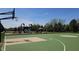 Community basketball court with playground and picnic area in the background at 14878 Horse Branch Way, Fishers, IN 46040