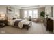 Relaxing primary bedroom with lots of natural light, neutral tones, and ample space at 14878 Horse Branch Way, Fishers, IN 46040
