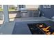 An outdoor kitchen and fire pit at 14878 Horse Branch Way, Fishers, IN 46040