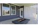 Covered patio with gas fire pit at 14878 Horse Branch Way, Fishers, IN 46040