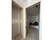 View of bathroom doorway with a tub/shower combo at 14910 Garden Mist Pl, Fishers, IN 46037