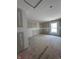 A bedroom with a bright window is ready to customize and add your own finishes at 14910 Garden Mist Pl, Fishers, IN 46037