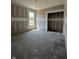 Unfinished bedroom showcases a window and closet space, providing a blank canvas for customization at 14910 Garden Mist Pl, Fishers, IN 46037