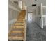 A view of the hallway and stairs leading to the second floor at 14910 Garden Mist Pl, Fishers, IN 46037
