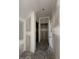 Hallway showcasing unfinished walls and doorways, highlighting the home's potential for personalization at 14910 Garden Mist Pl, Fishers, IN 46037